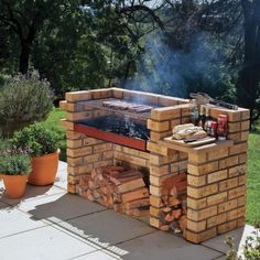 an outdoor bbq grill with lots of wood