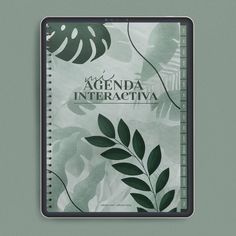 a notebook with the words agenda interactive written in front of leaves and branches on a light green background