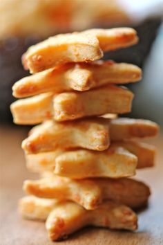 a stack of food sitting on top of a wooden table