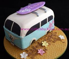 a cake that is shaped like a bus