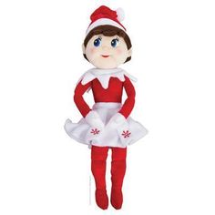 the elf doll is dressed in red and white