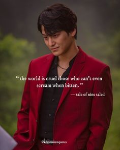 a man in a red suit and black shirt with a quote from the movie twilight