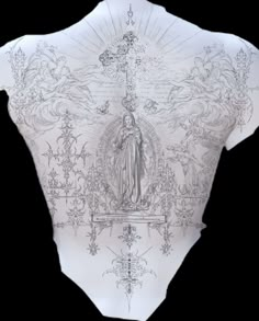 the back of a white shirt with an image of virgin mary on it's chest