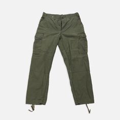 Vintage 1950s-1980s Military Pants Size: 32” Measurements: waist: 32” top to bottom crotch: 10.5” Vintage Straight Leg Cargo Pants With Patch Pockets, Retro Straight Leg Bottoms With Cargo Pockets, Retro Full-length Bottoms With Cargo Pockets, Retro Full-length Cargo Pants With Pockets, Retro Full Length Cargo Pants With Pockets, Vintage Wide Leg Cargo Bottoms, Retro Straight Pants With Pockets, Vintage Wide-leg Cargo Pants, Vintage Cargo Pants With Tapered Leg