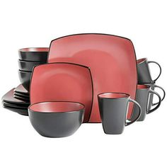 red and black dinnerware set with cups