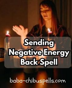 a woman sitting at a table with candles in front of her and the words sending negative energy back spell