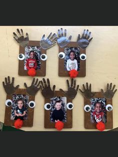 four frames with pictures of children's hands and eyeballs on them, hanging from the wall