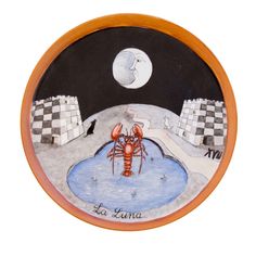 a plate with a lobster on it and the words la luna written in cursive writing