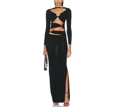 Introducing the Hot Fashionista Dakota Cutout Midi Dress in Black, a daringly chic ensemble designed to command attention and exude confidence with every step. Crafted from luxurious, figure-hugging fabric, this midi dress boasts an alluring silhouette that accentuates curves in all the right places. The timeless black hue adds a touch of sophistication, while strategic cutouts along the bodice and waistline inject a hint of edgy allure. The neckline plunges with understated elegance, drawing the eye upward and elongating the silhouette for a flattering effect. The midi length offers a perfect balance of sophistication and allure, making it suitable for a variety of occasions. Whether you're attending a cocktail party, a night out on the town, or a chic dinner date, the Hot Fashionista Dak Cutout Midi Dress, Exude Confidence, Cami Crop Top, Swimwear Cover Ups, Understated Elegance, Swimwear Cover, Outerwear Sweater, Lingerie Sleepwear, Dress 100