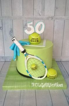 a cake made to look like a tennis racket and ball