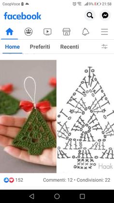 someone is holding a christmas tree ornament in their hand, and it looks like they are crocheted