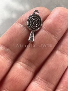 Silver alloy lollipop charms. Handmade from silver alloy. Perfect for a doll, earrings or a pendant. You will receive 5 charms Measures 2.2 x 1 cm Thank you. Doll Earrings, Earrings Pendant, Lollipop, Etsy Accessories, Electronic Accessories, Dolls, Purses And Bags, Music Clothes, Pendant