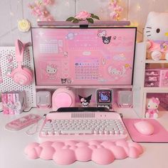 a desktop computer sitting on top of a desk next to a keyboard and mouse pad