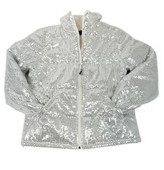 Shine bright and stay warm with our white sequin zip up jacket! This trendy jacket reflects a puffer feel and provides a more basic color option without feeling too basic. Plus, the sequin detailing adds a playful touch to this must-have jacket. Stay stylish and cozy this season! White Sequined Outerwear For Party, White Sequined Long Sleeve Outerwear, Casual Sequined Outerwear For Winter, Casual Winter Outerwear With Sequins, Trendy Jackets, Zipper Jacket, Zip Up Jacket, Girls Jacket, Basic Colors