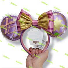 100% Authentic And Brand New Disney Parks Merchandise Memories Of Disney Magic Will Continue To Shine Whenever You Wear This Sparkly Ear Headband Soft Padded Minnie Mouse Ears Satin Finished Ears Feature Screen Art Design Detailed With Gold Filigree Around The Edge Corset Ribbon On One Side, Screen Art With Pascal On Another Lace Boarder Velour Non-Slip Interior One Size Fits Most Polyester / Exclusive Of Decoration Approx. 11 1/4'' H X 9 3/4'' W X 1 1/2'' D Imported Rapunzel Disney Ears, Pink Ears Headband Gift, Pink Ears Headband As Gift, Pink Headband With Ears For Gift, Rapunzel Ears, Rapunzel Pascal, Corset Ribbon, Diy Disney Ears, Diy Mickey Ears