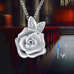 Meaningful Memorial: The Sterling Silver Rose Urn Necklace is designed to hold the ashes of your loved ones, family members, or beloved pets (dogs, cats). It serves as a beautiful keepsake and memorial, allowing you to carry their memory with you wherever you go. Elegant Rose Design: The pendant features a delicate rose flower design, symbolizing love, beauty, and remembrance. It is a timeless and elegant piece that adds a touch of sophistication to any outfit. Material: High-Quality Sterling Si Rose Shaped Urn Necklace Sterling Silver, Rose Flower Design, Jewelry For Ashes, Flower Urn, Urn Pendant, Urn Necklace, Hair Locks, Urn Necklaces, Pets Dogs