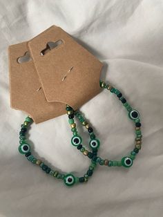 dark green evil eye bracelet 🍀 ...meaning behind dark green evil eye bracelet: Garners happiness; Balance in your life; Freedom to pursue new ideas Green Evil Eye Bracelet, Evil Eye Bracelet Meaning, Eye Bracelet Meaning, Bracelet Meaning, Green Evil Eye, Design Blouse, Eye Bracelet, Evil Eye Bracelet, New Ideas