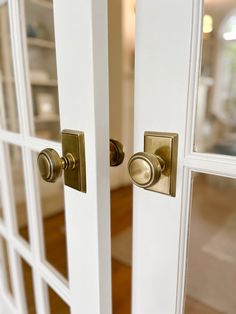 an open door with two knobs on each side