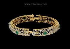 18 karat gold diamond kada for women with color stones - set of 2 (1pair)
  note : this item comes with a clip. so that you can open it and wear it directly on your wrist.
  note : minimum size : 2-4 & maximum size : 2-5.



introducing our exquisite 18 karat gold diamond kada for women with color stones - set of 2 (1pair) from totaram jewelers, the perfect blend of elegance and luxury. made in india, this stunning piece of jewelry is sure to turn heads and make a statement wherever yo Kada For Women, Diamond Kada, Color Stones, Stone Settings, Stone Color, Gold Diamond, 18k Gold, Size 2, India