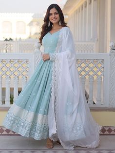 Introducing our stunning "fascinating sky-blue embroidered georgette function wear gown", a must-have addition to your ethnic wear collection. This exquisite gown features intricate sequin work and thread embroidery, adding a touch of glamour and elegance to your look. The sky-blue color is perfect for any festive occasion, event, or function, making you stand out in the crowd.
Made from high-quality georgette fabric, this fully stitched gown is available in sizes ranging from XS to XXL, ensurin Blue Anarkali, Gown With Dupatta, Designer Gown, Bollywood Lehenga, Exquisite Gowns, Anarkali Gown, Madhuri Dixit, Party Kleidung, Anarkali Suit