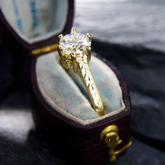 an engagement ring with a diamond in it