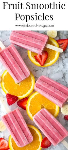 fruit smoothie popsicles with bananas, strawberries and oranges on ice cubes