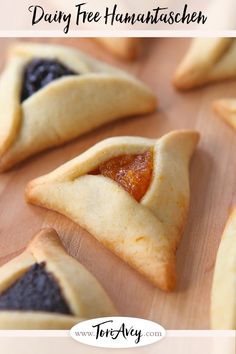 there are several small pieces of food on the table with text overlay that reads dairy free hamantaschen