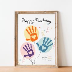 a happy birthday card with handprints and balloons in the shape of two hands