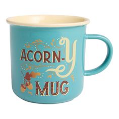 a blue coffee mug with the words acorn y mug on it's side