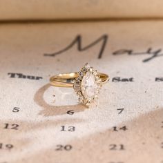 a close up of a ring on top of a piece of paper