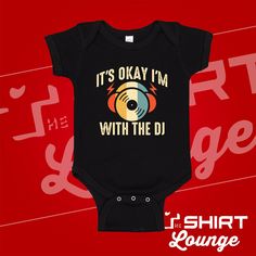 "\"It's Ok I'm With The DJ\" Baby Bodysuit or Toddler T-Shirt is a perfect gift for any disc jockey parents, a unique pregnancy announcement/reveal, the future DJ baby, or just because it is so cute! It's also a great gift for a baby who is a music lover. Don't forget to snap a picture of baby in this adorable outfit with their favorite disk jockey.  Need a customization? We are happy to help, feel free to send us a message.  This creeper/toddler shirt is sure to put a smile on anyone's face who Funny Fitted Black Onesie, Unique Pregnancy Announcement, Baby Present, Baby Presents, Disc Jockey, Gender Neutral Baby Clothes, It's Okay, Vinyl Crafts, Music Lover