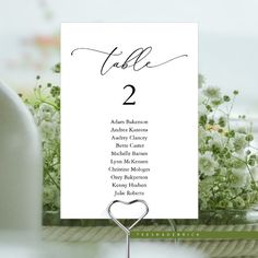 a table number card with a heart on it