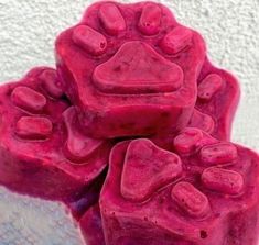 three pink soaps with hearts on them