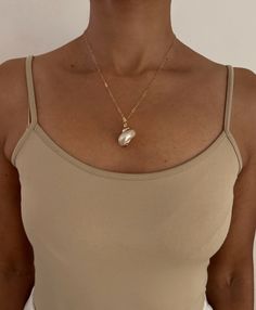 Every piece of jewelry you add to your collection should have a special meaning, allowing you to relive a unique or special moment in your life. The necklace is made with 14k gold filled shiny/dainty chain. Necklace is a perfect gift for birthday, bridesmaid, holiday, or "just because" gift. - Gold Filled White Conch Sea Shell 14K Gold Filled Paper Clip Chain Gold Filled Lobster Clasp and Jump Ring 18" Length Our collections are designed to be worn together or mixed and matched. Shop with intent Elegant Recycled Gold Pendant Chain Necklace, Elegant Pendant Chain Necklace In Recycled Gold, Chic Teardrop Necklace For Gift, Elegant Recycled Gold Chain Necklace Gift, Rose Gold 14k Gold Necklace With Pearl Pendant, Dainty Charm Necklaces For Wedding, Elegant Recycled Gold Necklaces As Gift, Elegant Recycled Gold Necklaces For Gift, Feminine Yellow Gold Pendant Necklaces