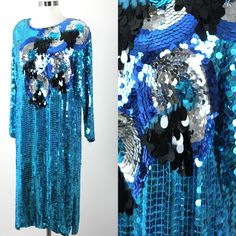 "Such a beauty and quite a fun dress!! Fabulous for that Gatsby Flapper Party...so festive..or any other kind of sparkly event you might have!! This is vintage, and the sequins on this were metal, some of the color is coming off on some of the sequins, This is slight, and not noticeable, but it is there..so the price reflects this. However, the colors are fabulous and it is your chance to get a vintage piece for a great price..that will make you shine!! Measuring: 42\" length Width: 42\" Sleeves Festive Long Sleeve Sequin Dress, Embellished Sequin Dress For Costume Party And Holiday, Vintage Long Sleeve Dress For Night Out, Blue Long Sleeve Sequin Party Dress, Blue Long Sleeve Sequin Dress For Party, Vintage Embellished Long Sleeve Dresses, Vintage Dresses For Festive Party Season, Vintage Long Sleeve Holiday Dresses, Long Sleeve Beaded Party Dress