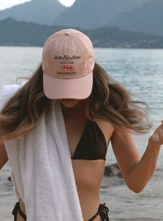 Inspired by the Dolce Far Niente lifestyle. Floating under the stunning Positano coastline, soaking up the art of doing nothing. Light pink cap, embroidery in taupe & orange, with a luxe satin interior lining. Pink Baseball Cap For Beach With Curved Bill, Pink Cap For Travel, Pink Travel Cap, Beach Dad Hat With Flat Brim, Adjustable Dad Hat For Beach, Beach Dad Hat With Curved Brim, Cute Baseball Hats, The Art Of Doing Nothing, Art Of Doing Nothing