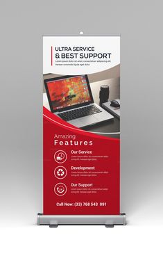 a red and white roll up banner with an image of a laptop on the screen