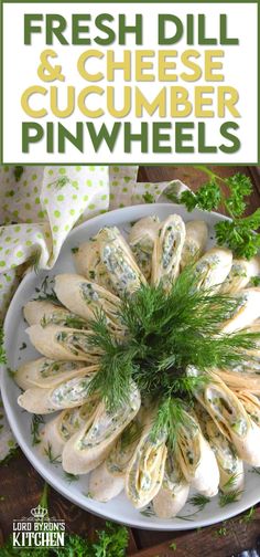 fresh dill and cheese cucumber pinwheels on a white platter