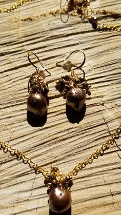 Hand Crafted 2Pc Set. Necklace, and Matching Earrings Made with Chocolate Brown Baroque Pearls and Crystal beads with a Gold  Plated chain One of a Kind. Chocolate Jewelry, Set Necklace, Gold Plated Chains, Baroque Pearls, Matching Earrings, Chocolate Brown, Crystal Beads, Jewelry Sets, Hand Crafted