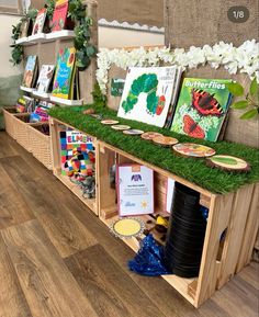 the bookshelf is filled with children's books and crafts for sale at the store