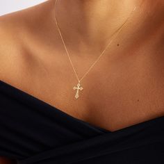 "1- P R O D U C T ∙ D E S C R I P T I O N This 14k gold cross necklace is a beautiful and timeless piece of jewelry, perfect for everyday wear or special occasions. The 14k gold material offers a stunning shine and durability, ensuring that this necklace will last for years to come. The cross design adds a touch of elegance and spirituality, making it a thoughtful gift for anyone who values faith. 2- P R O D U C T ∙ D E T A I L S Diamond quality: * Diamond carat: 0.06 ct. * Clarity: SI2 * Color: Diamond Cut Cross Pendant Necklace, White Gold Cross Necklace With Clavicle Chain, Fine Jewelry Diamond Cut Crucifix Cross Necklace, Sterling Silver Crucifix Cross Necklace, Elegant Diamond Cut Cross Necklace, Fine Jewelry Cross Necklace For Anniversary, Elegant Diamond Cut Cross Pendant Necklace, 14k Gold Diamond Cut Cross Necklace, 14k White Gold Crucifix Necklace