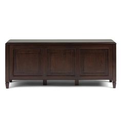 the sideboard is made from wood and has three doors