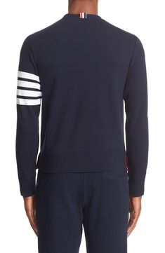 A quartet of thick stripes bands one arm of a well-appointed cotton sweatshirt replete with dapper details like a signature logo patch and a buttoned split hem. Style Name:Thom Browne Stripe Sleeve Sweatshirt. Style Number: 5155852_1. Classic Navy Sweatshirt With Ribbed Cuffs, Striped Crew Neck Sweatshirt With Ribbed Collar, Classic Striped Tops With Ribbed Cuffs, Classic Navy Sweatshirt With Ribbed Collar, Cotton Striped Sweatshirt With Striped Cuffs, Classic Long Sleeve Sweater With Contrast Stripes, Cotton Crew Neck Sweatshirt With Contrast Stripes, Cotton Sweatshirt With Contrast Stripes And Crew Neck, Cotton Crew Neck Sweatshirt With Striped Cuffs