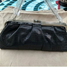 Nwot Ann Taylor Clutch, Kiss Lock Purse. Navy Blue, Leather, Croc Embossed, Silver, Round,Chain Strap, Metal Silver Tone Frame With Kiss Lock Closure. Beige Interior With Side Zipper Pocket. Kiss Lock Purse, Beige Interior, Blue Leather, Chain Strap, Blue And Silver, Side Zipper, Mini Bag, Ann Taylor, Zipper Pocket