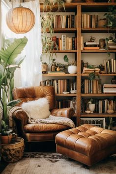 a living room filled with lots of books and furniture