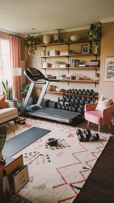 a living room filled with furniture and a treadmill