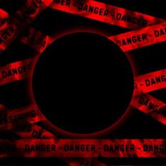 a black circle surrounded by red tape with danger written on it in the center,