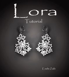 the front cover of lora's book, with an image of two earrings