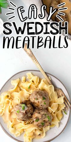 a white plate topped with meatballs and pasta