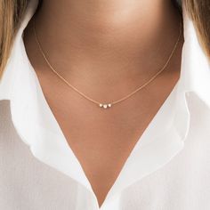 Our delicate round diamond necklace makes the perfect accessory! This dainty diamond necklace features 3 round brilliant cut prong set diamonds along with a sturdy 1.3mm cable chain and spring clasp for additional security. Our meaningful diamond necklace is available in three different 14K Gold colors: White Gold and Yellow Gold. ✨ Features ✨ • Ready To Ship. • Made in the USA.• Gold : Solid 14K• Choice of Gold: Yellow Gold, White Gold• Diamond Cut: Round • 3 VS quality Genuine Diamonds• Packag Dainty Gold Necklace Simple & Dainty Jewelry, 3 Diamond Necklace Simple, Minimal Diamond Pendant, Earring Necklace Ring Set, Fine Necklace Gold, Minimalistic Diamond Necklace, Simple Gold Diamond Necklace, Grad Jewelry Gold, Dainty Everyday Necklace